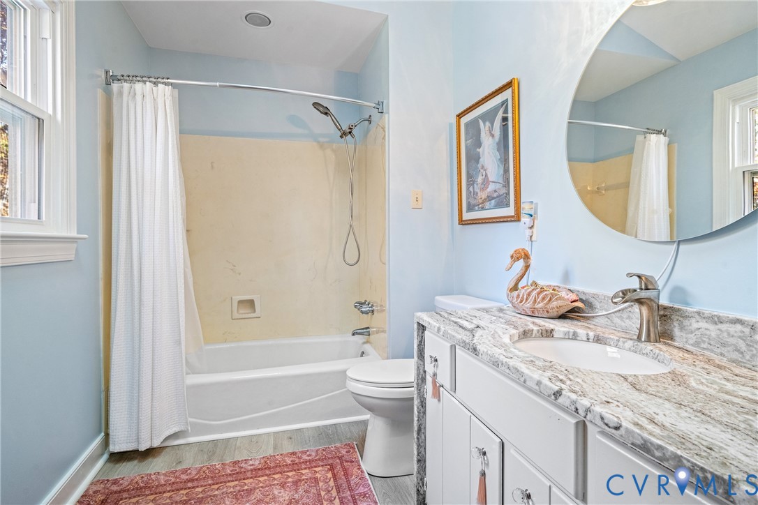 8404 Copperpenny Terrace Chesterfield, VA 23832 - Photo 19 of 40 a bathroom with a granite countertop sink toilet and shower