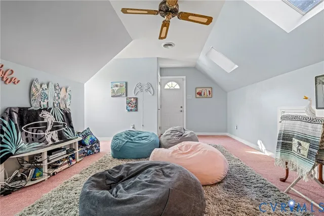 a bedroom with furniture and a view of bedroom