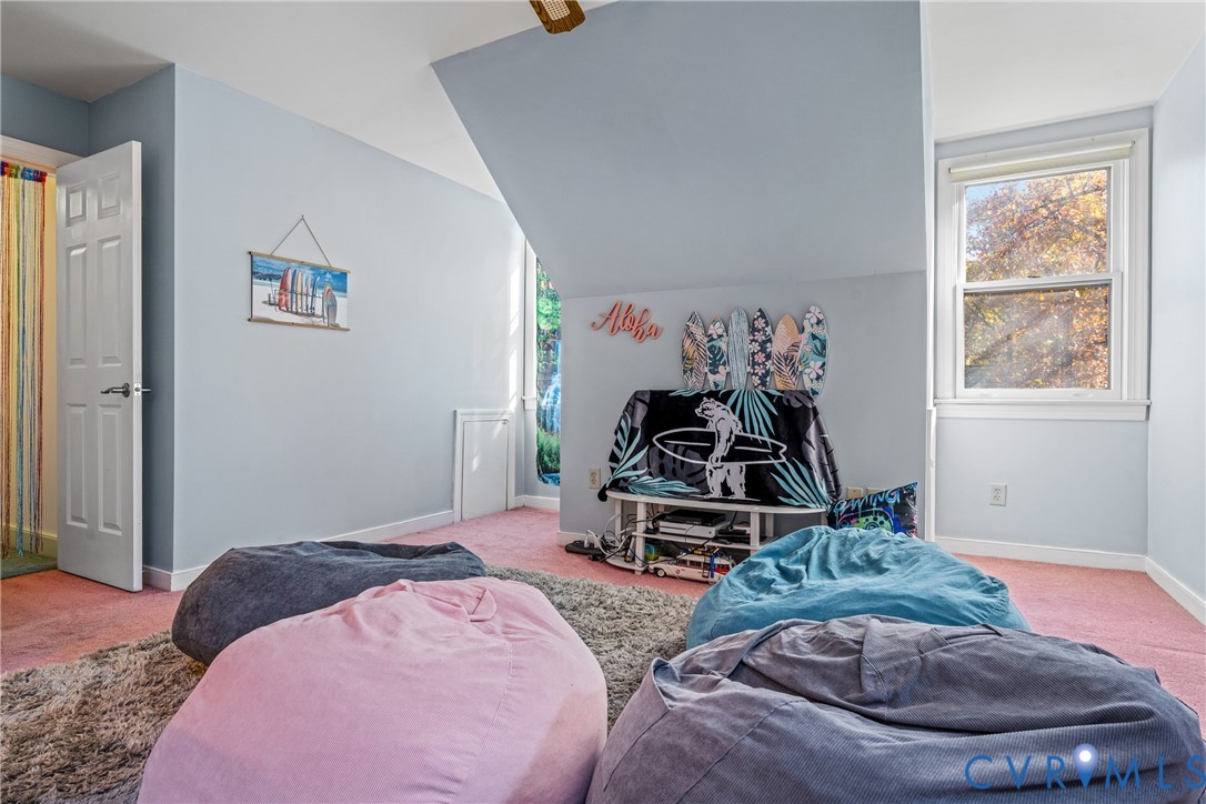 8404 Copperpenny Terrace Chesterfield, VA 23832 - Photo 24 of 40 a bedroom with a bed and a wooden floor