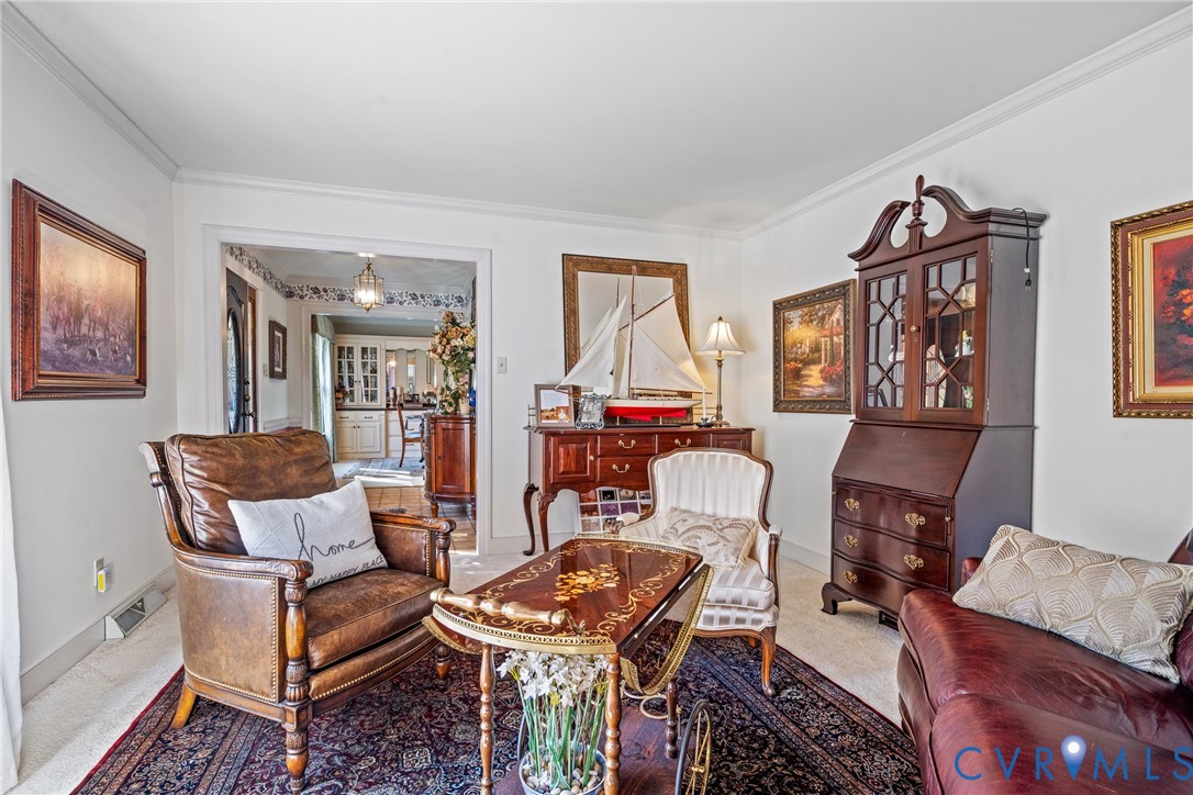 8404 Copperpenny Terrace Chesterfield, VA 23832 - Photo 9 of 40 a living room with furniture and a window