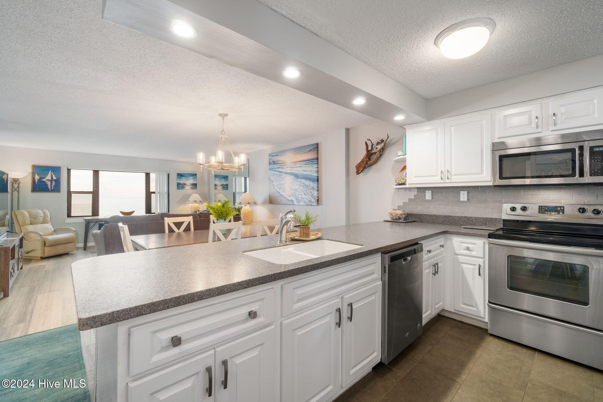 1505 Salter Path Road, Unit 203 A SUMMER WINDS Atlantic Beach, NC 28512 - Photo 16 of 42 Kitchen w/ peninsula seating
