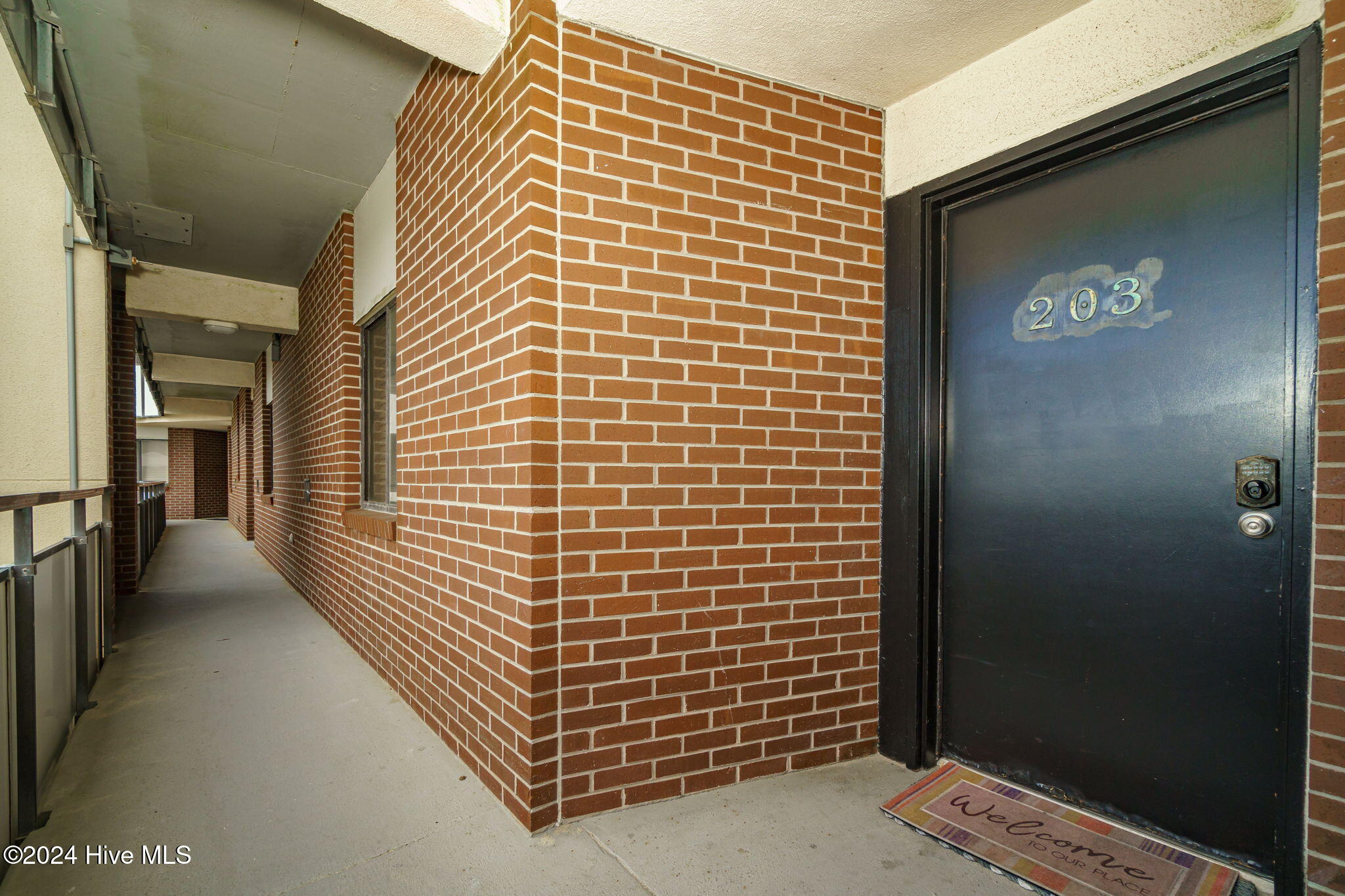 1505 Salter Path Road, Unit 203 A SUMMER WINDS Atlantic Beach, NC 28512 - Photo 26 of 42 Covered entrance to unit 203