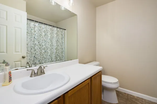 a bathroom with a sink and a toilet