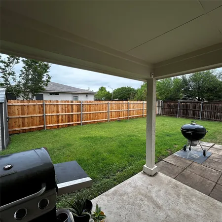 a view of a garden with a slide