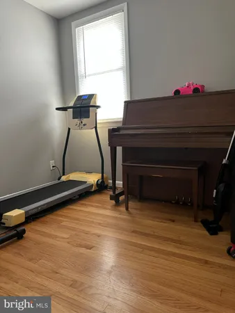 a bedroom with a bed and a table