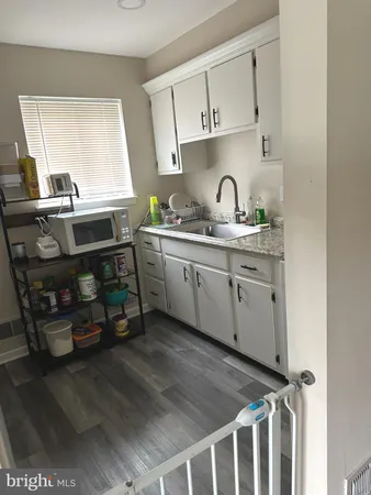 a room with a dresser and a mirror