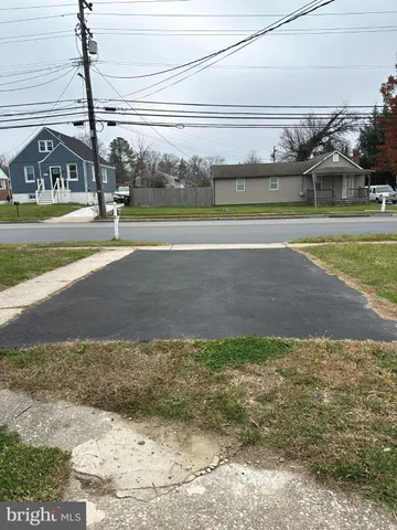 a view of a street with houses