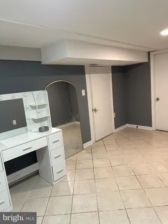 a view of a hallway with stairs