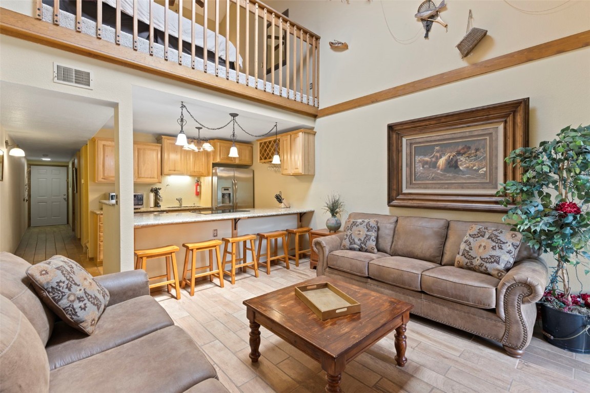 570 Bills Ranch Road, Unit 325 Frisco, CO 80443 - Photo 1 of 30 a living room with furniture and a large window