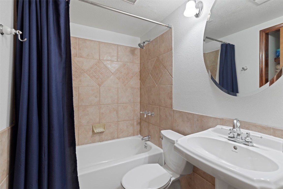 570 Bills Ranch Road, Unit 325 Frisco, CO 80443 - Photo 11 of 30 a bathroom with a sink toilet and shower