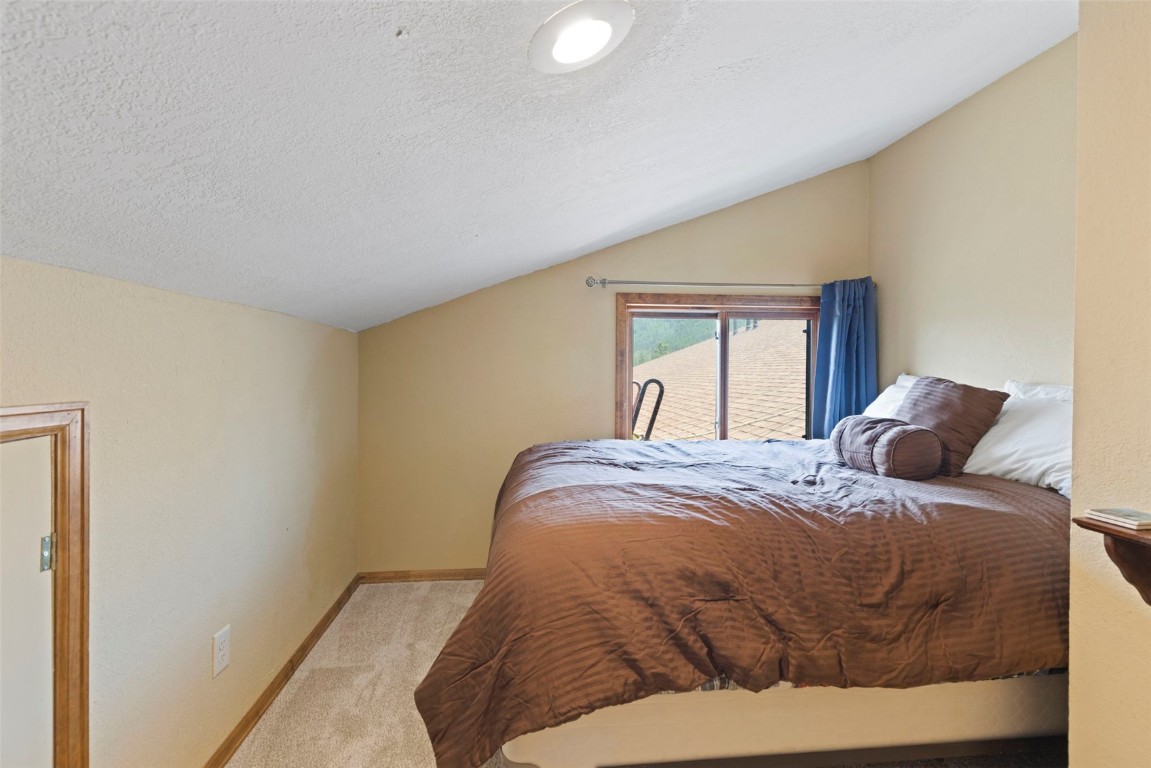 570 Bills Ranch Road, Unit 325 Frisco, CO 80443 - Photo 20 of 30 a bedroom with a bed and closet