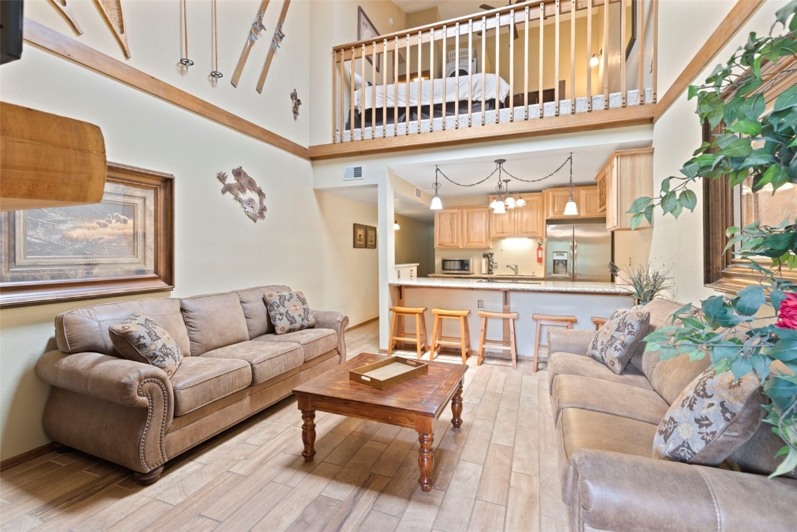 570 Bills Ranch Road, Unit 325 Frisco, CO 80443 - Photo 2 of 30 a living room with furniture and a large window