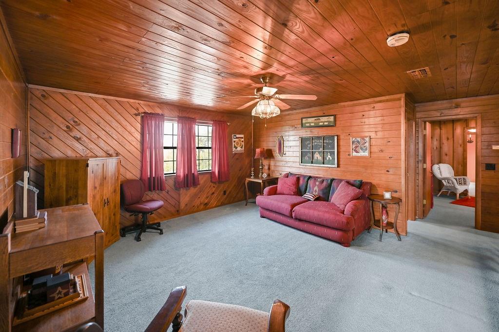 411 Rs County Road 4525 Point, TX 75472 - Photo 18 of 40 a living room with furniture and a fireplace