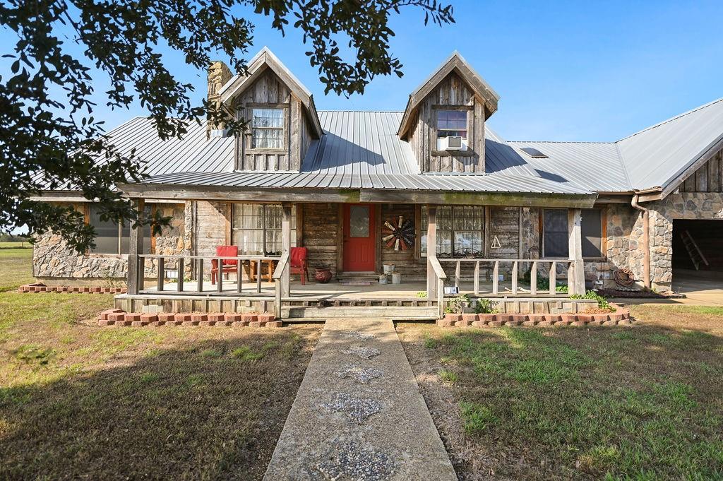 411 Rs County Road 4525 Point, TX 75472 - Photo 26 of 40 a front view of a house with a yard