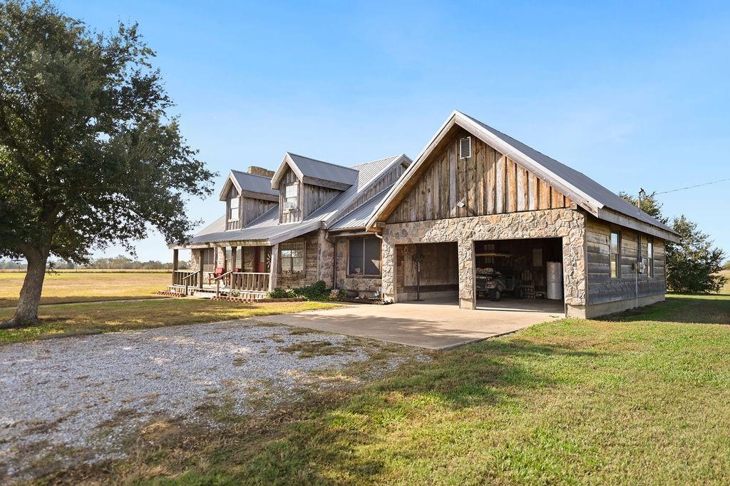 411 Rs County Road 4525 Point, TX 75472 - Photo 27 of 40 a front view of a house with a yard