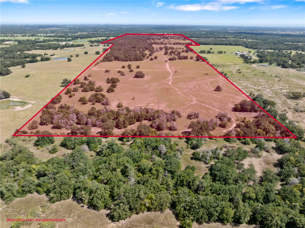 an aerial view of beach and ocean