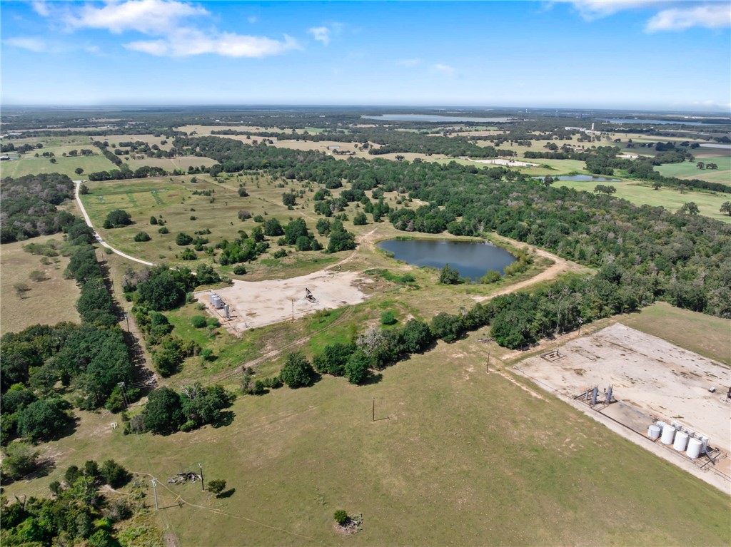 4796 Britten Road Bryan, TX 77807 - Photo 14 of 41 Aerial view of property's location with a nearby body of water and rural landscape