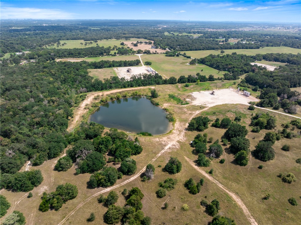 4796 Britten Road Bryan, TX 77807 - Photo 27 of 41 an aerial view of ocean and residential houses with outdoor space