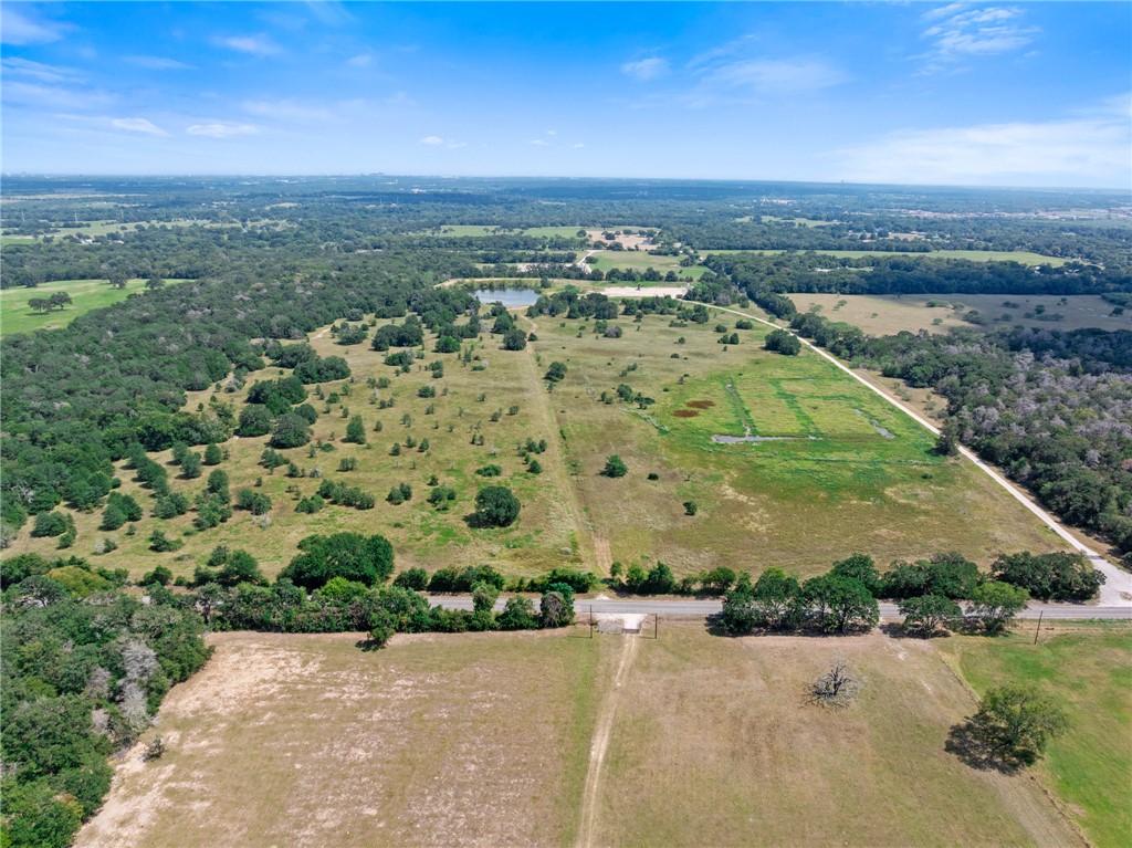 4796 Britten Road Bryan, TX 77807 - Photo 32 of 41 Aerial view of property and surrounding area featuring rural landscape