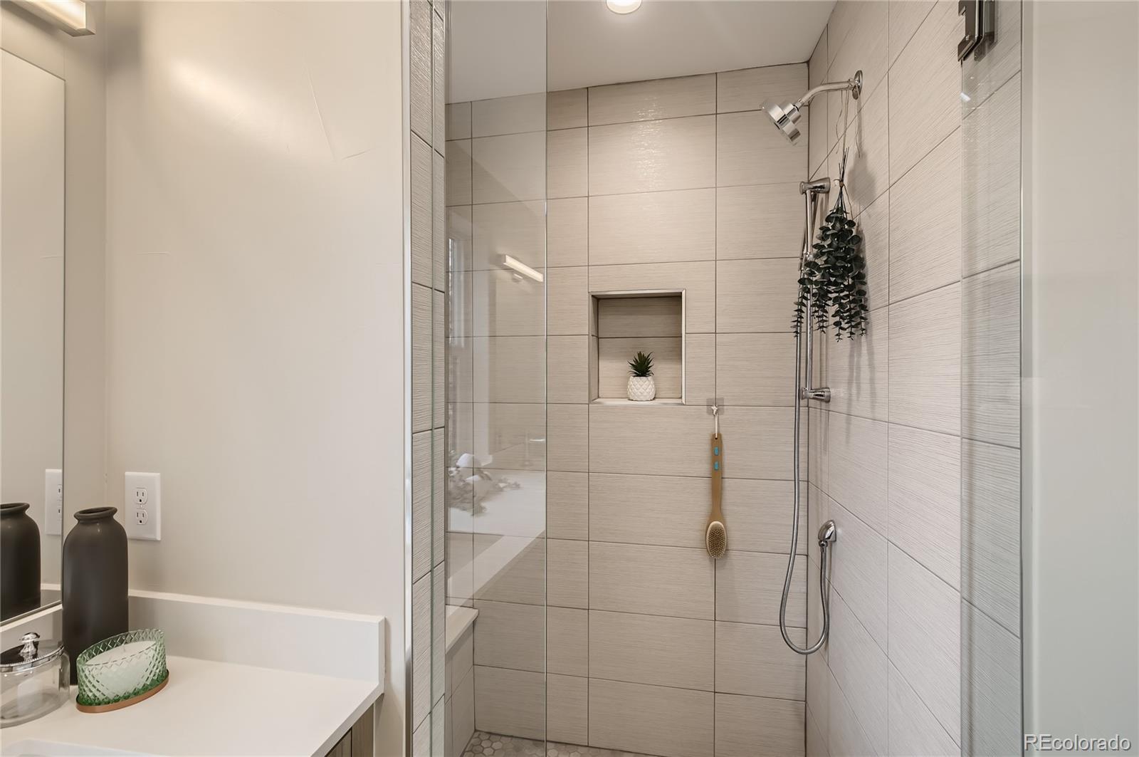 2323 South High Street Denver, CO 80210 - Photo 9 of 21 a bathroom with a shower