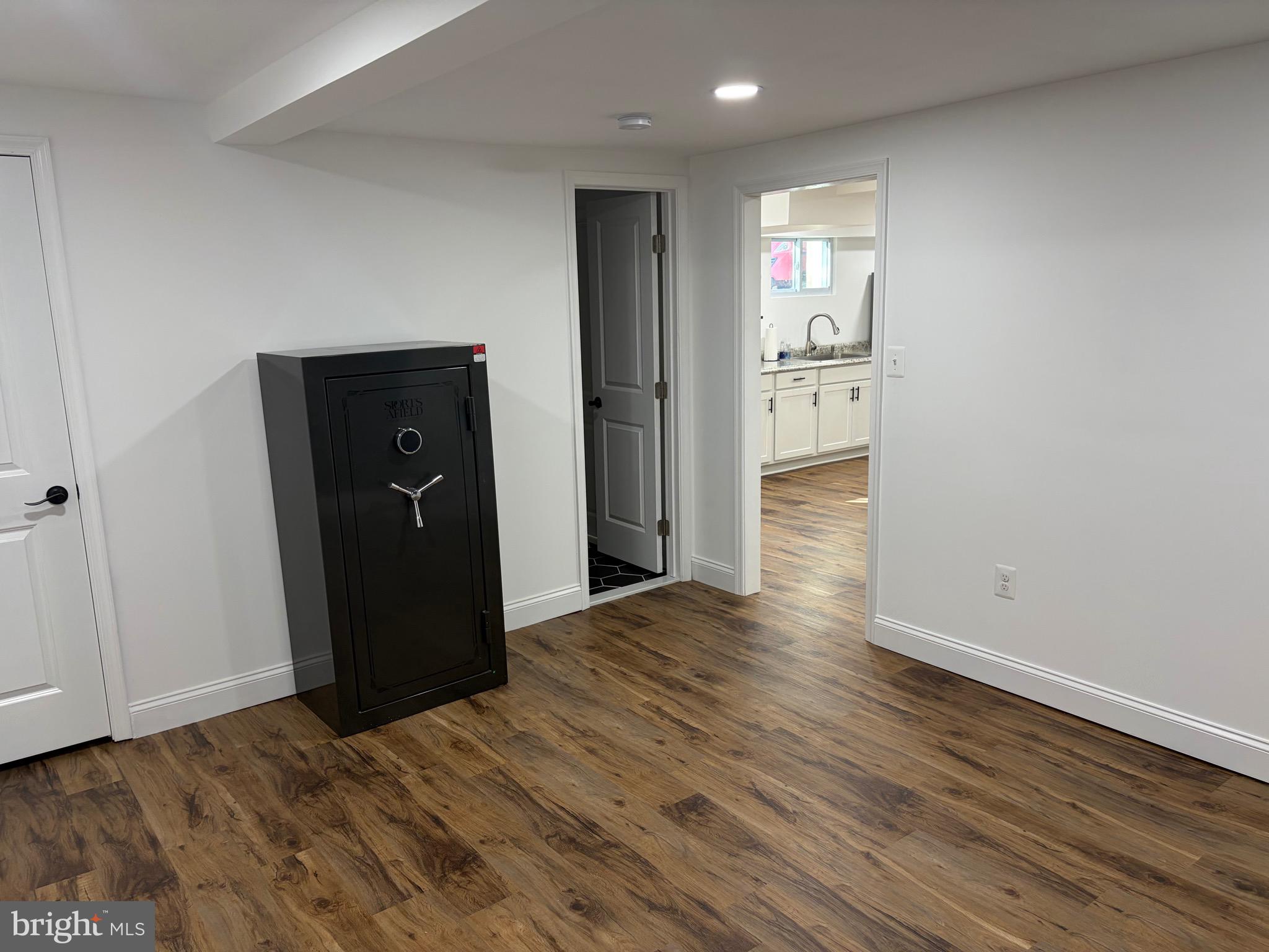 1806 Johnson Road Annapolis, MD 21409 - Photo 11 of 31 a view of an empty room with wooden floor and closet