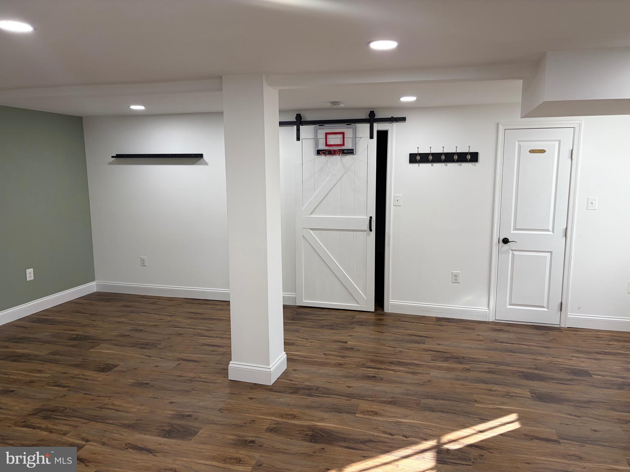 1806 Johnson Road Annapolis, MD 21409 - Photo 14 of 31 a view of empty room with wooden floor