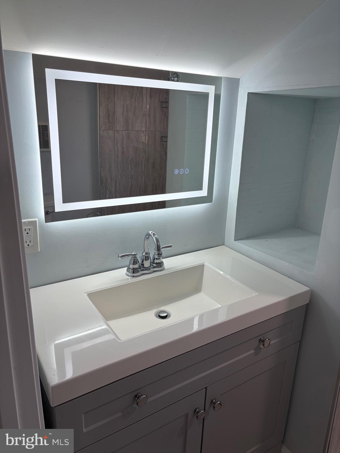 1806 Johnson Road Annapolis, MD 21409 - Photo 18 of 31 a bathroom with a sink and vanity