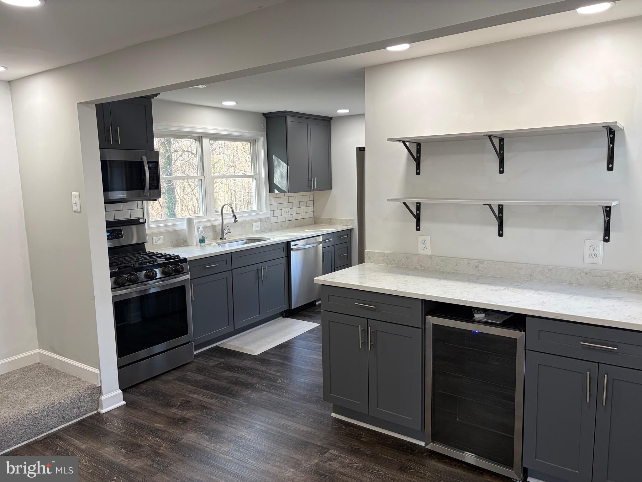 1806 Johnson Road Annapolis, MD 21409 - Photo 25 of 31 a kitchen with a sink and cabinets