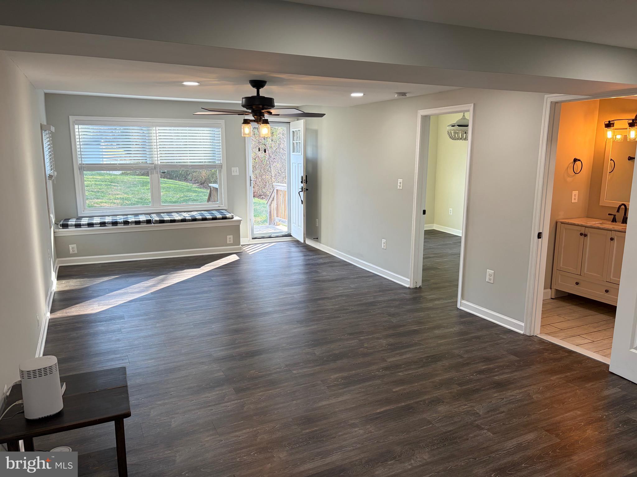 1806 Johnson Road Annapolis, MD 21409 - Photo 30 of 31 a view of a livingroom with a furniture wooden floor and a window