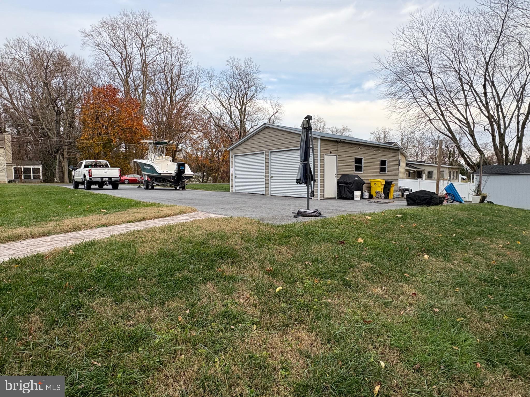 1806 Johnson Road Annapolis, MD 21409 - Photo 6 of 31 a view of a yard with a house and a tree
