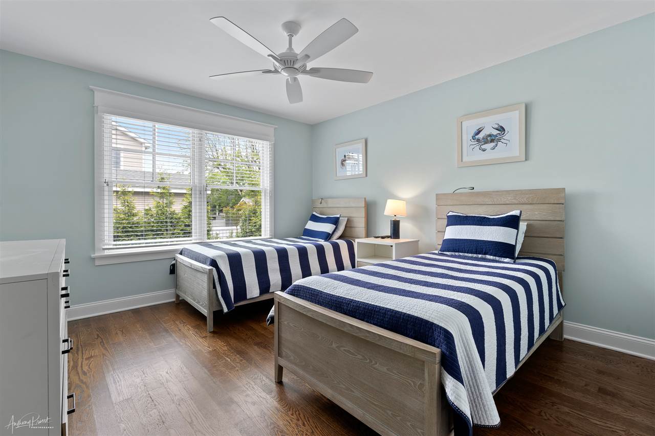 45 West 26th Avalon, NJ 08202 - Photo 14 of 24 a bedroom with two beds and a large window