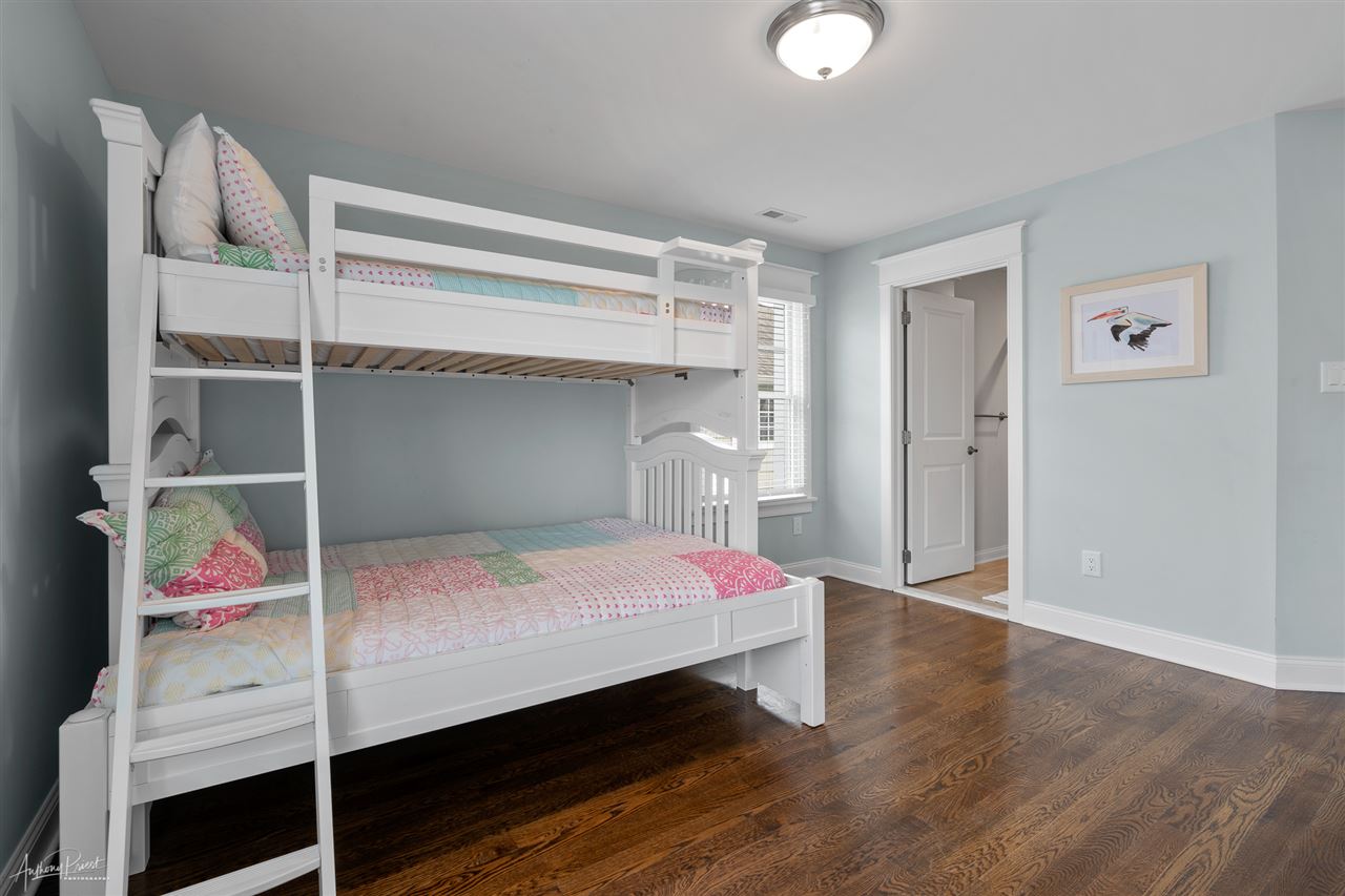 45 West 26th Avalon, NJ 08202 - Photo 15 of 24 a bedroom with a bed and a closet