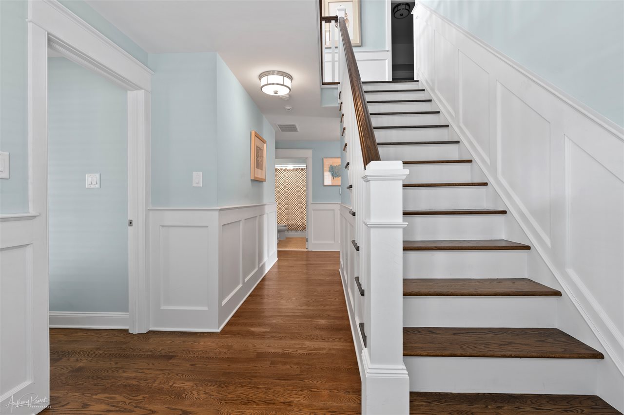 45 West 26th Avalon, NJ 08202 - Photo 17 of 24 a view of a hallway with wooden floor and entryway