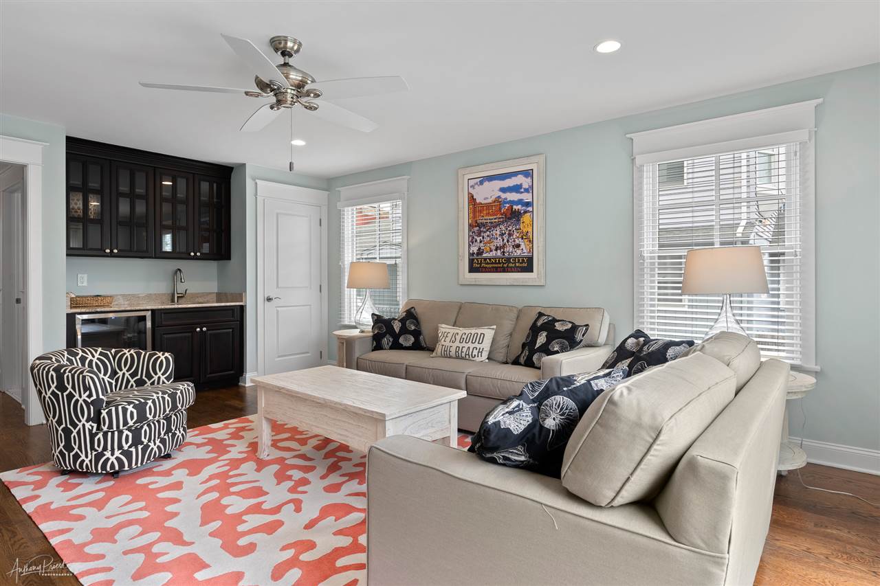 45 West 26th Avalon, NJ 08202 - Photo 19 of 24 a bedroom with furniture and wooden floor