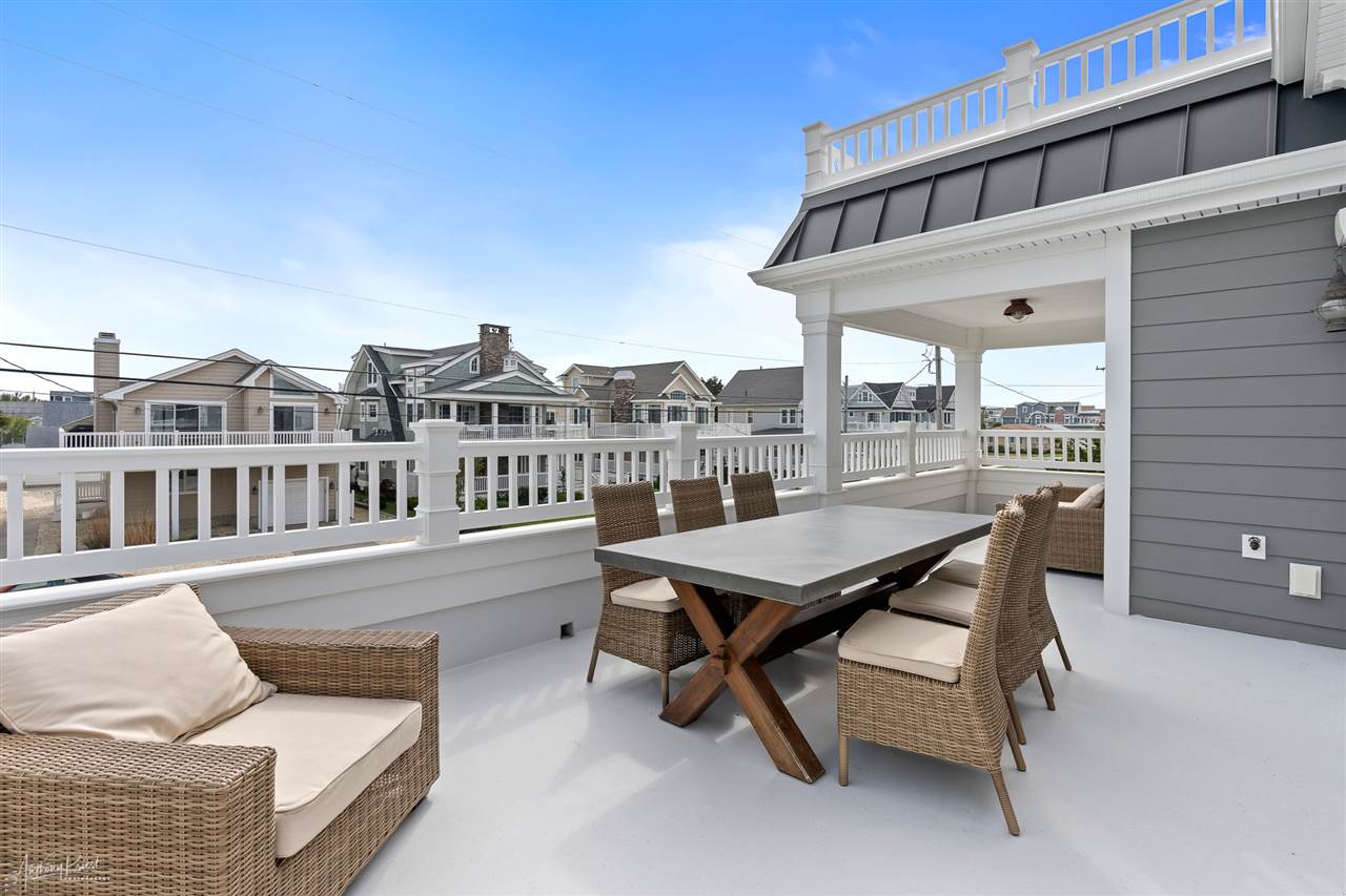 45 West 26th Avalon, NJ 08202 - Photo 8 of 24 a terrace of a house with outdoor seating