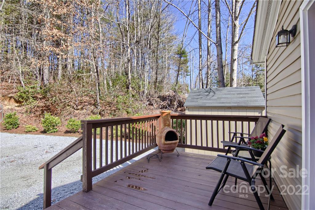20 Cascade Village Road, Unit 2 Pisgah Forest, NC 28768 - Photo 27 of 36 a view of a wooden roof deck