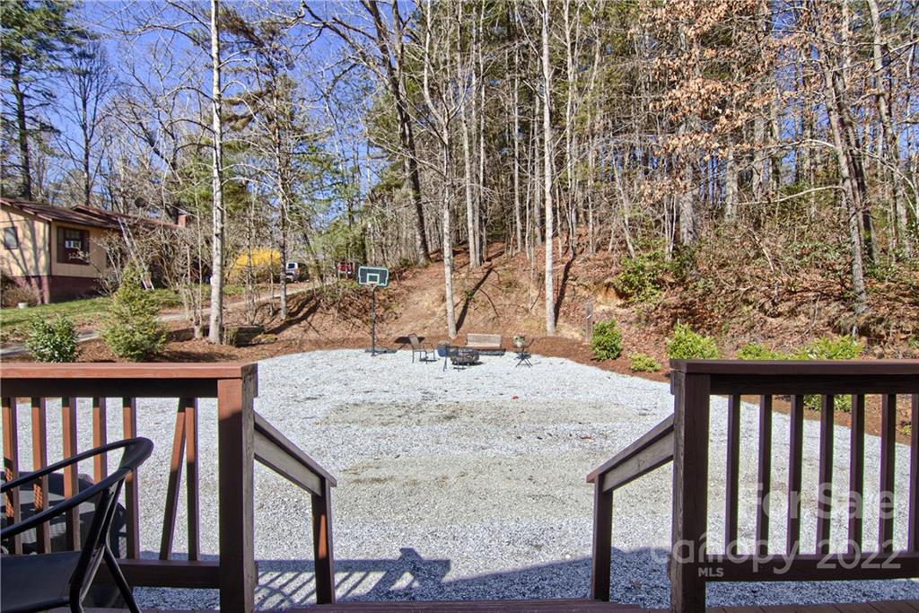 20 Cascade Village Road, Unit 2 Pisgah Forest, NC 28768 - Photo 29 of 36 a view of a backyard with wooden fence
