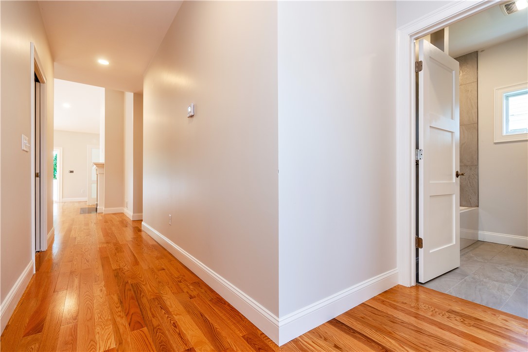 19 Hampton Road, Unit 69 Coventry, RI 02816 - Photo 9 of 49 Hallway leading to Primary bedroom and living area.
Photos of similar models