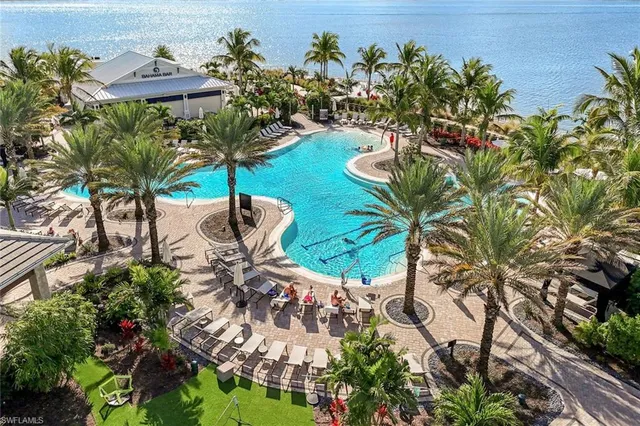 a view of a balcony with an ocean