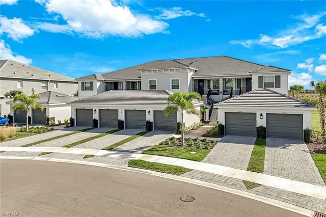 an aerial view of a house with outdoor space