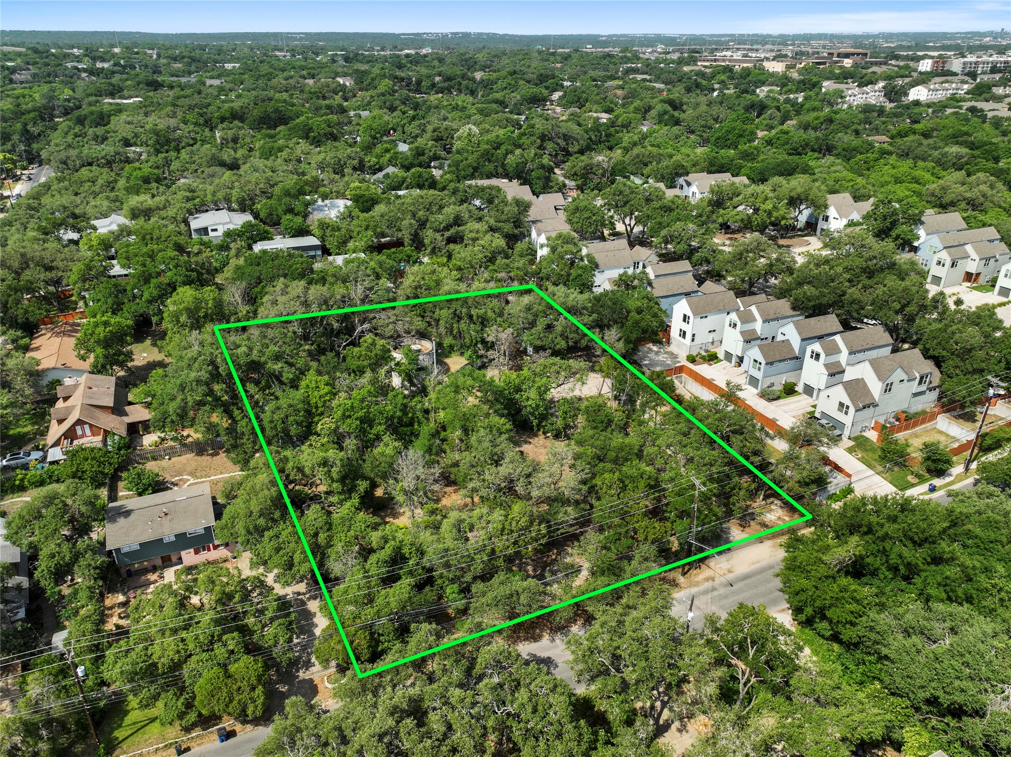 1801 Lightsey Road Austin, TX 78704 - Photo 2 of 12 an aerial view of residential houses with outdoor space and trees