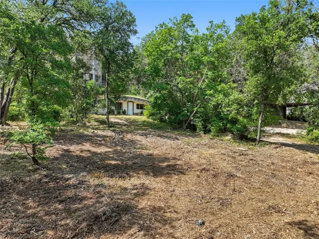 a view of outdoor space and yard