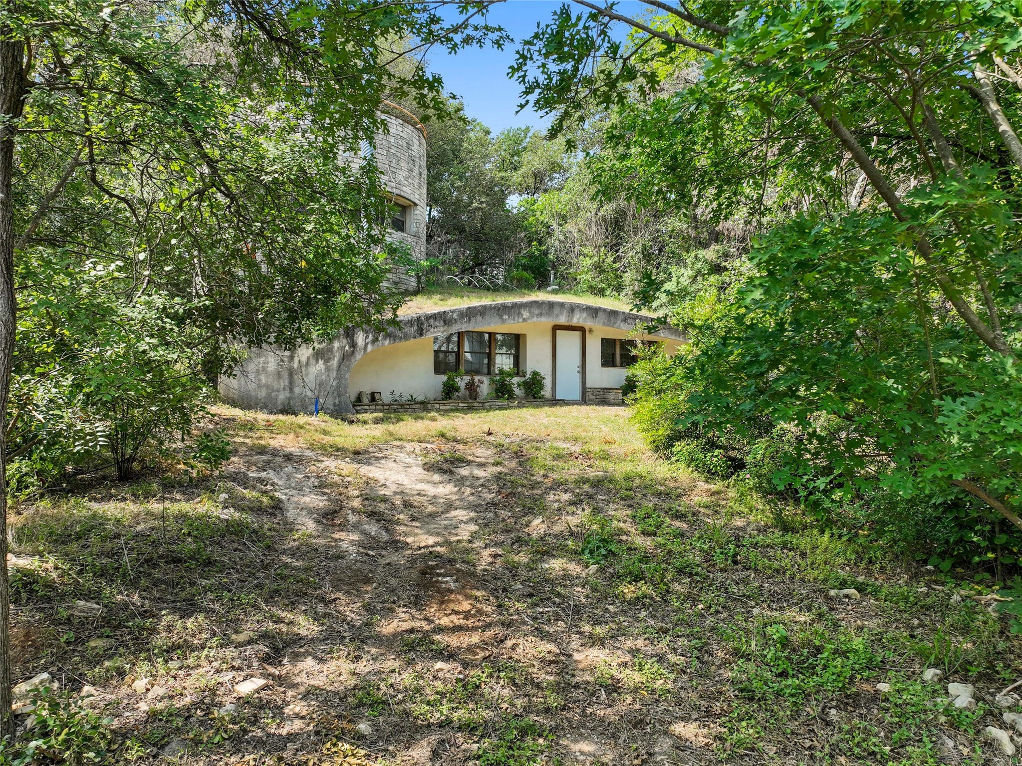 1801 Lightsey Road Austin, TX 78704 - Photo 8 of 12 a view of house with yard and sitting area