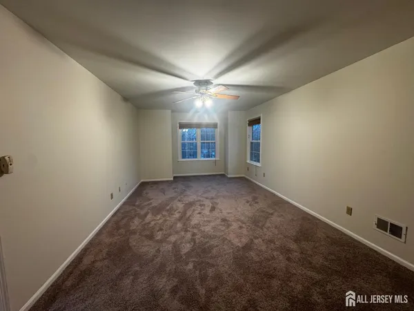 a kitchen with stainless steel appliances granite countertop a refrigerator a sink dishwasher a stove top oven a sink and dishwasher