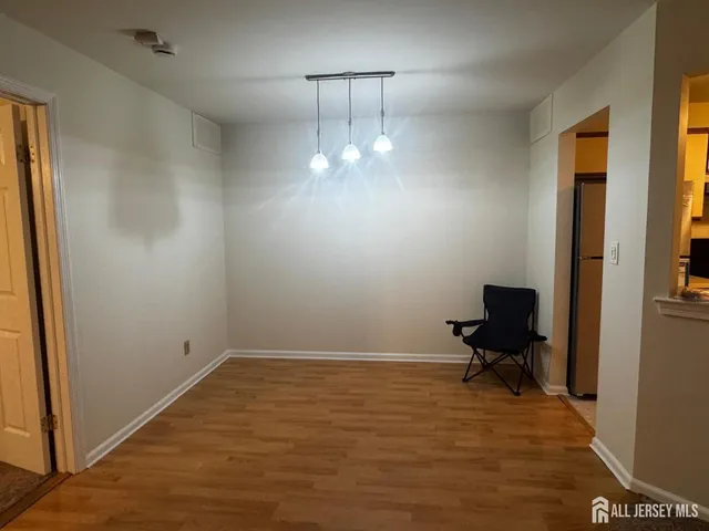 a view of a room with a large window