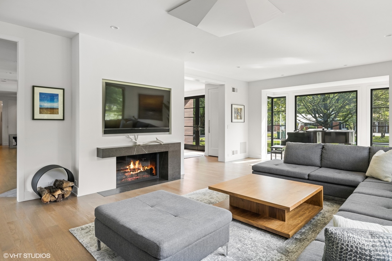 15 Longmeadow Road Winnetka, IL 60093 - Photo 17 of 71 a living room with furniture and a fireplace