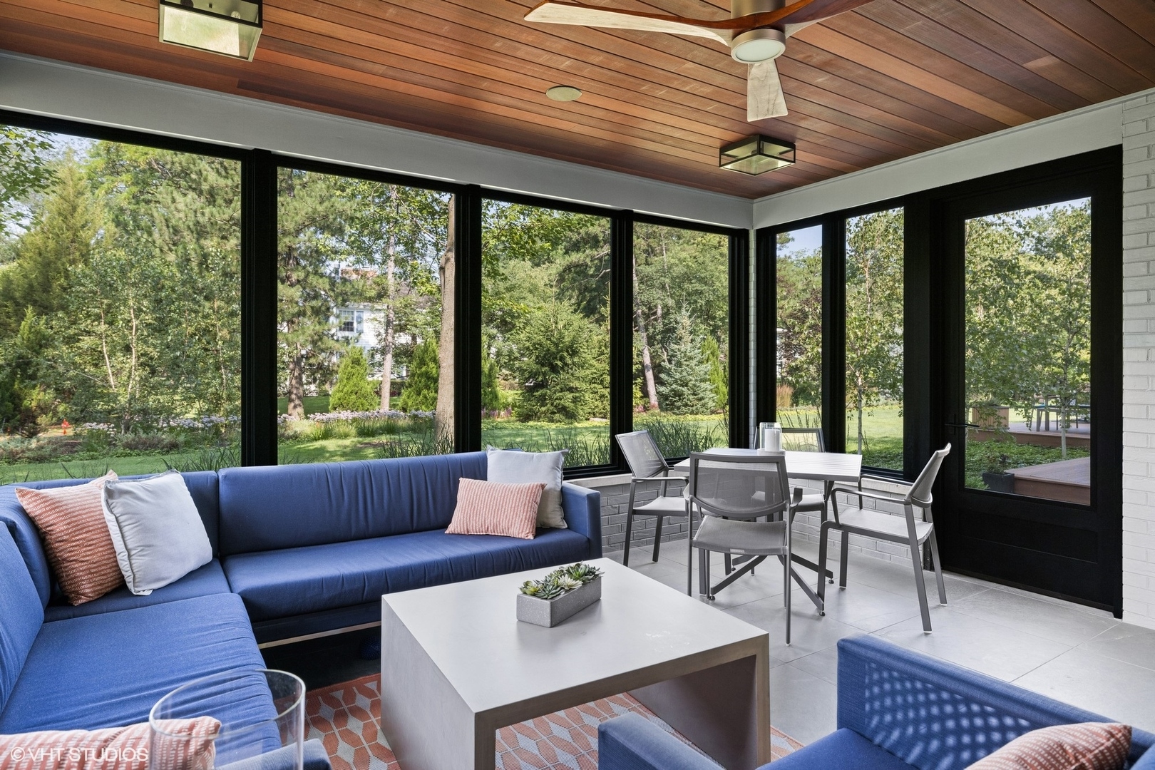 15 Longmeadow Road Winnetka, IL 60093 - Photo 21 of 71 a living room with furniture and floor to ceiling windows