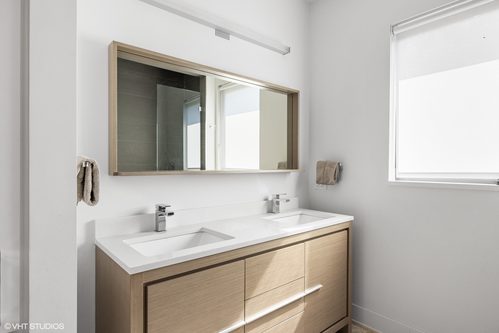 15 Longmeadow Road Winnetka, IL 60093 - Photo 26 of 71 a bathroom with a sink and a mirror