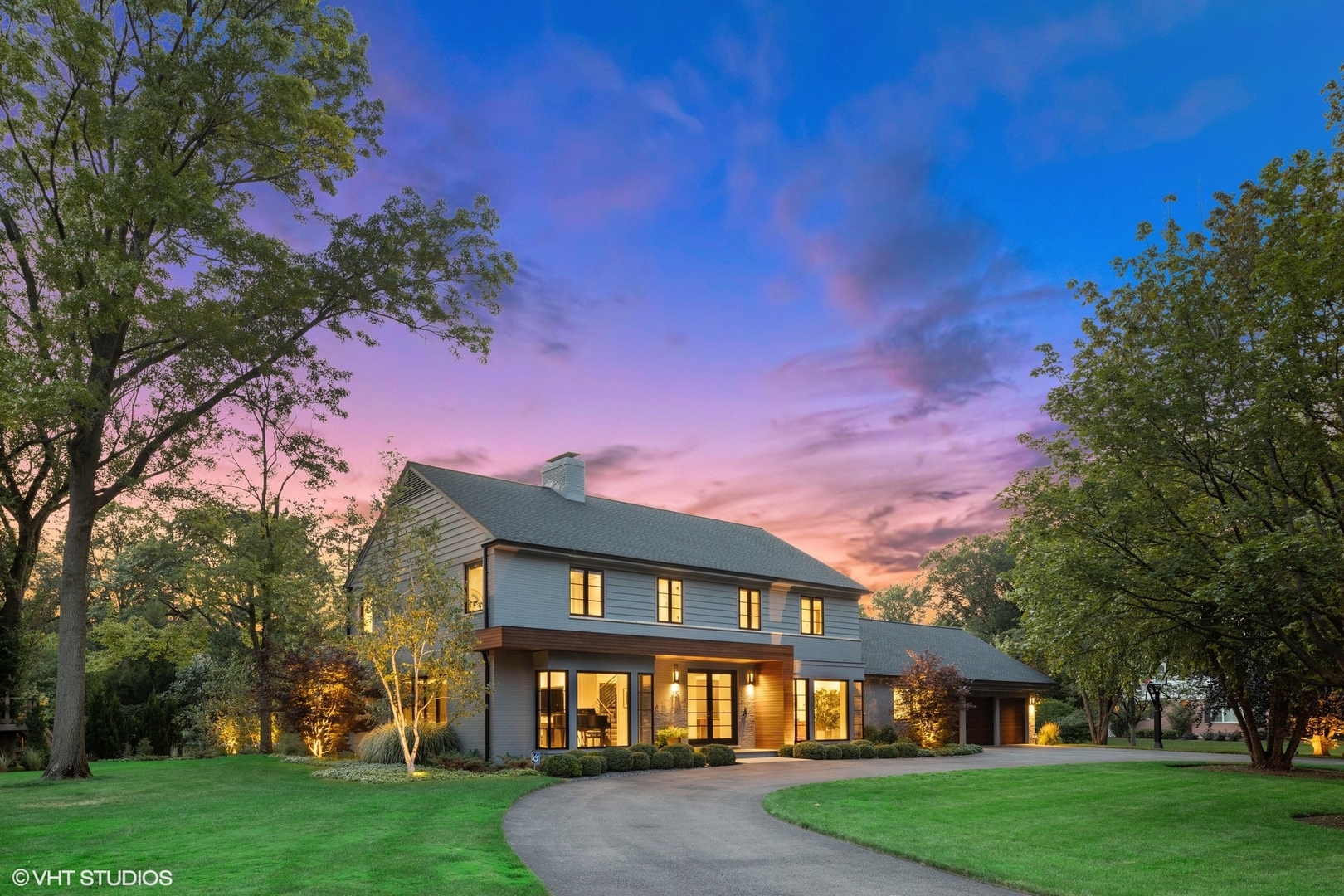 15 Longmeadow Road Winnetka, IL 60093 - Photo 3 of 71 a front view of a house with a yard