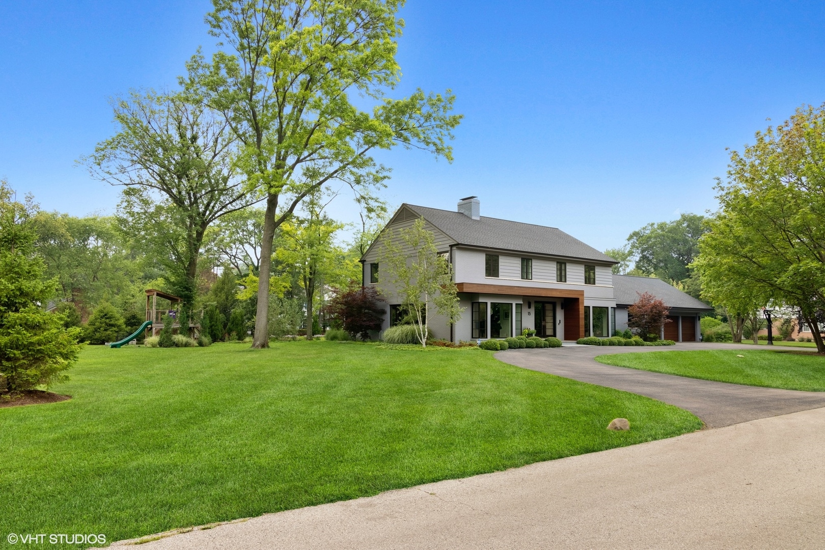 15 Longmeadow Road Winnetka, IL 60093 - Photo 50 of 71 front view of a house with a yard